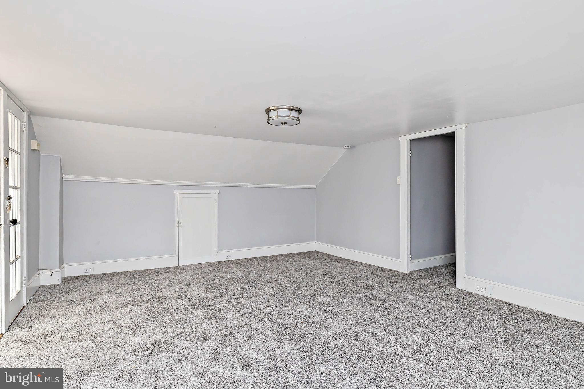 20 East Merchant Street, Unit C Audubon, NJ 08106 - Photo 13 of 26 an empty room with an entryway