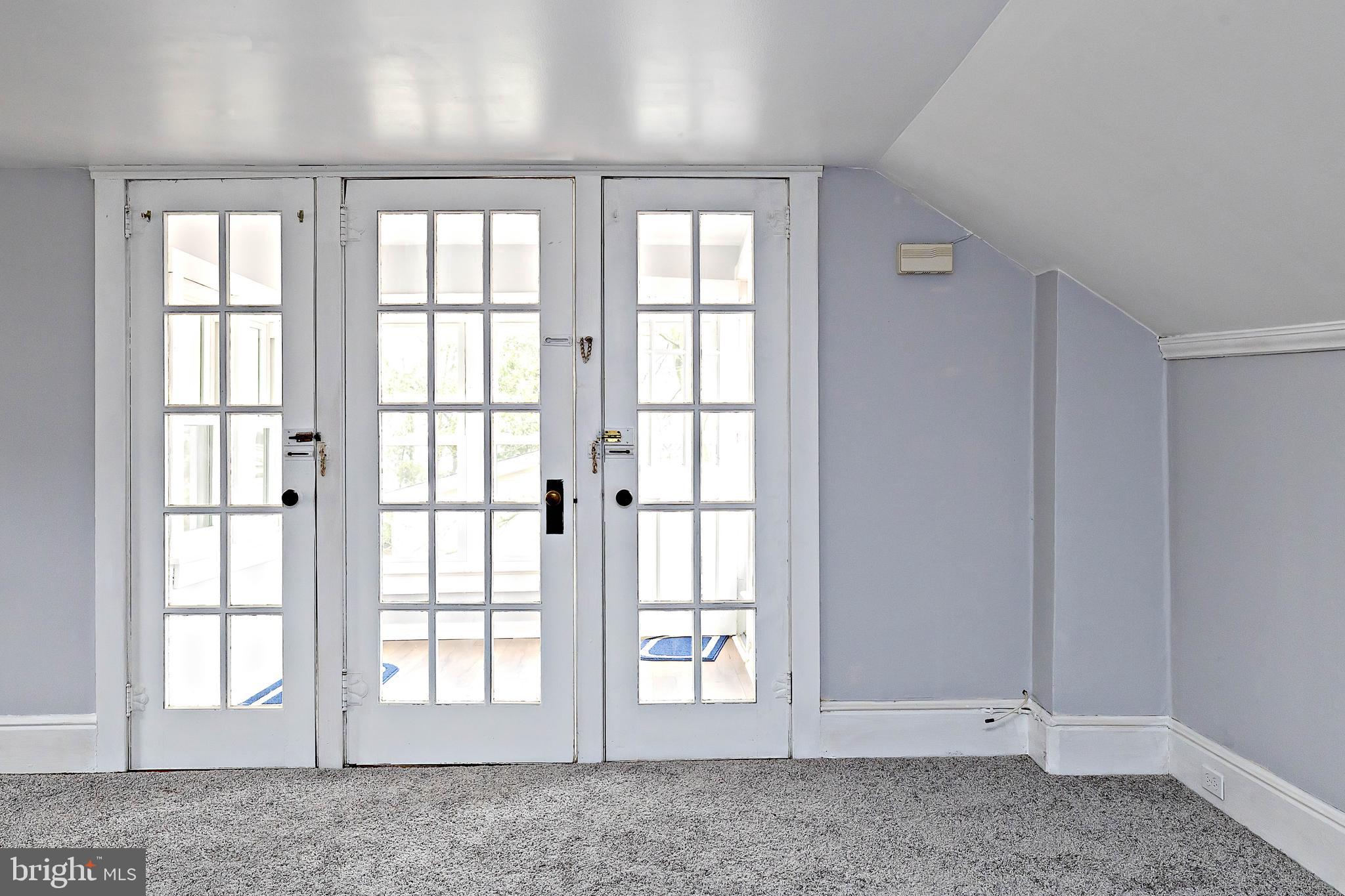 20 East Merchant Street, Unit C Audubon, NJ 08106 - Photo 15 of 26 an empty room with windows