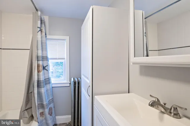 a bathroom with a sink and a tub