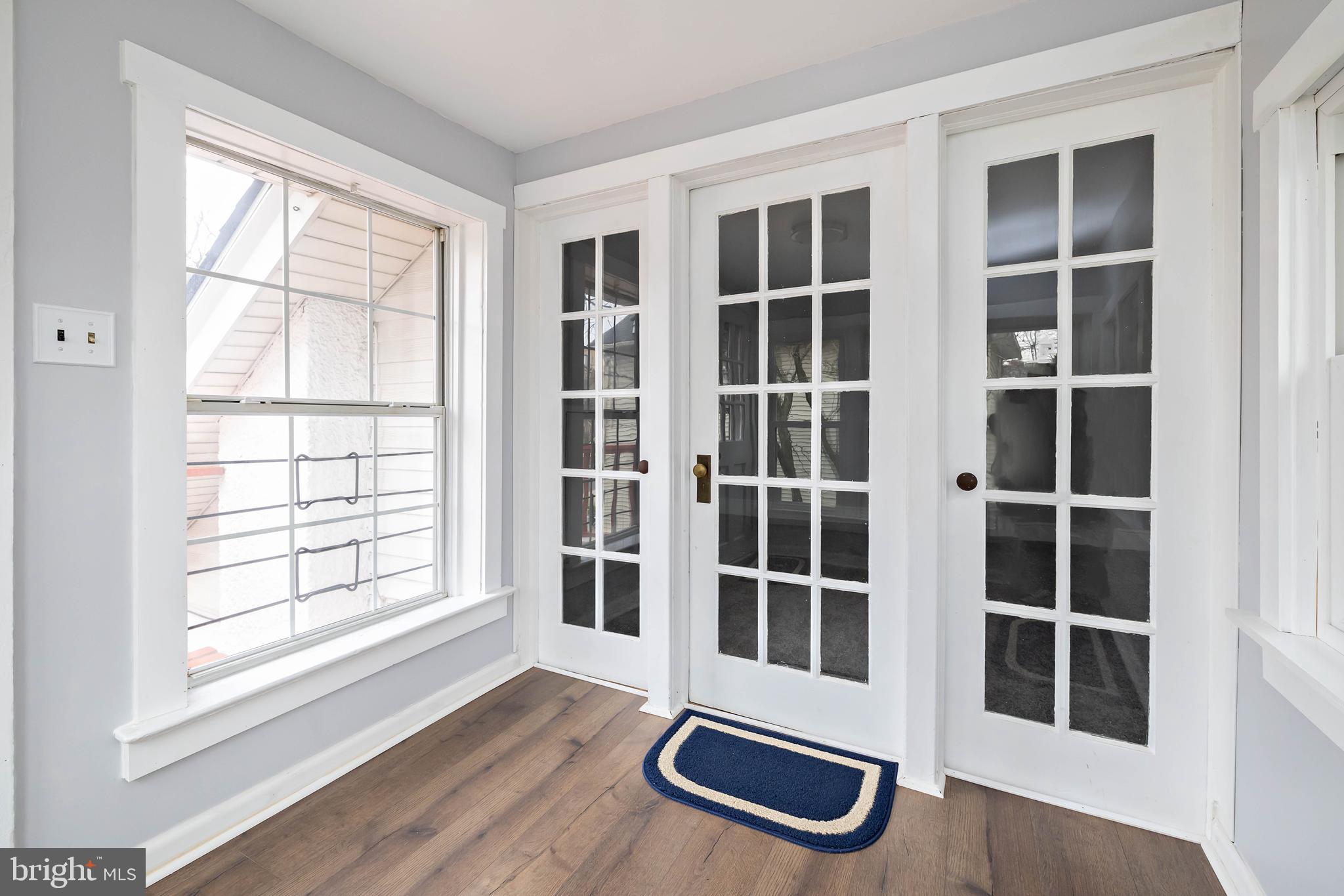 20 East Merchant Street, Unit C Audubon, NJ 08106 - Photo 7 of 26 an empty room with windows