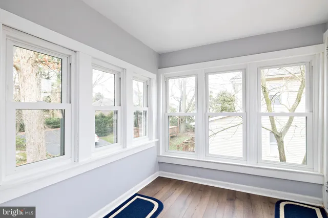 a view of a room that has a window in it