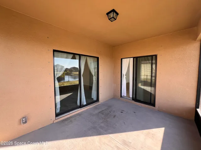 a view of a livingroom with a staircase