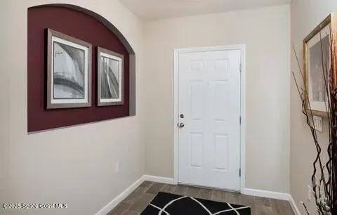 a view of livingroom with hallway and closet