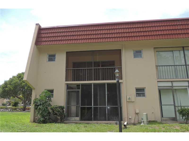 4112 Inverrary Drive, Unit 13F Lauderhill, FL 33319 - Photo 13 of 13 a view of a house with a window
