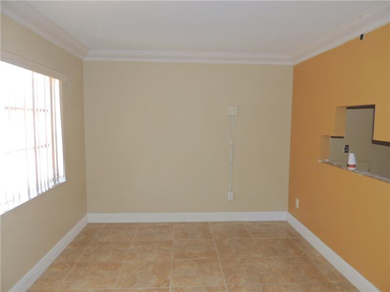 4112 Inverrary Drive, Unit 13F Lauderhill, FL 33319 - Photo 4 of 13 a view of a room that has a window in it