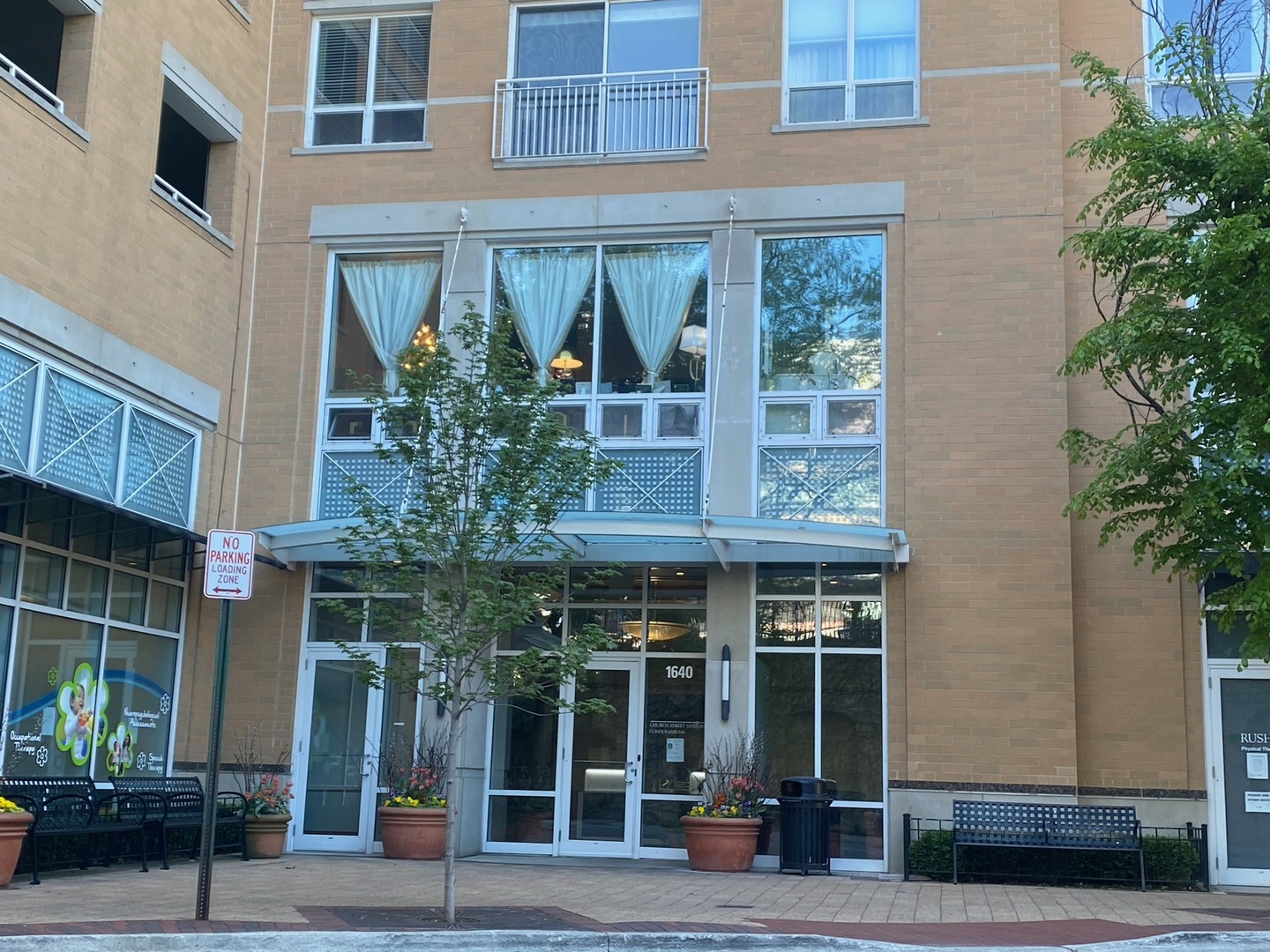 1640 Maple Avenue, Unit 203 Evanston, IL 60201 - Photo 1 of 10 a view of a building with a window and balcony