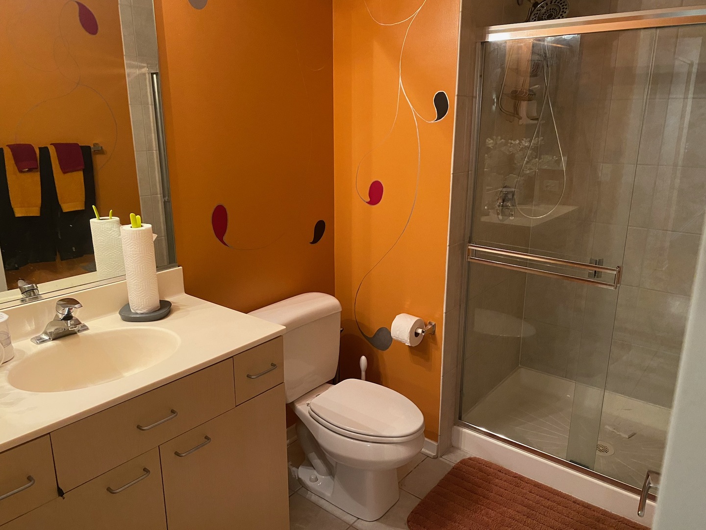 1640 Maple Avenue, Unit 203 Evanston, IL 60201 - Photo 9 of 10 a bathroom with a sink a toilet and shower