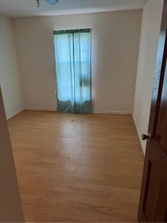 an empty room with window