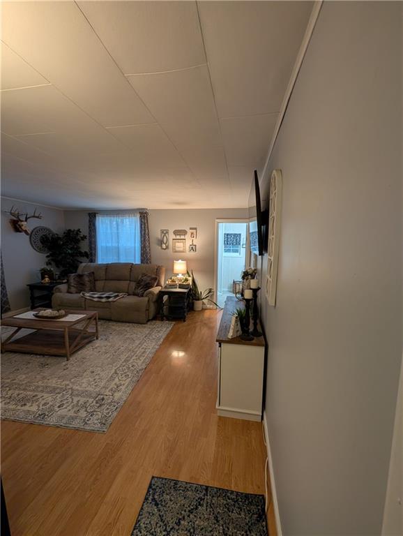 238 Hagentown Road Parker, PA 16049 - Photo 17 of 30 a living room with furniture and a wooden floor