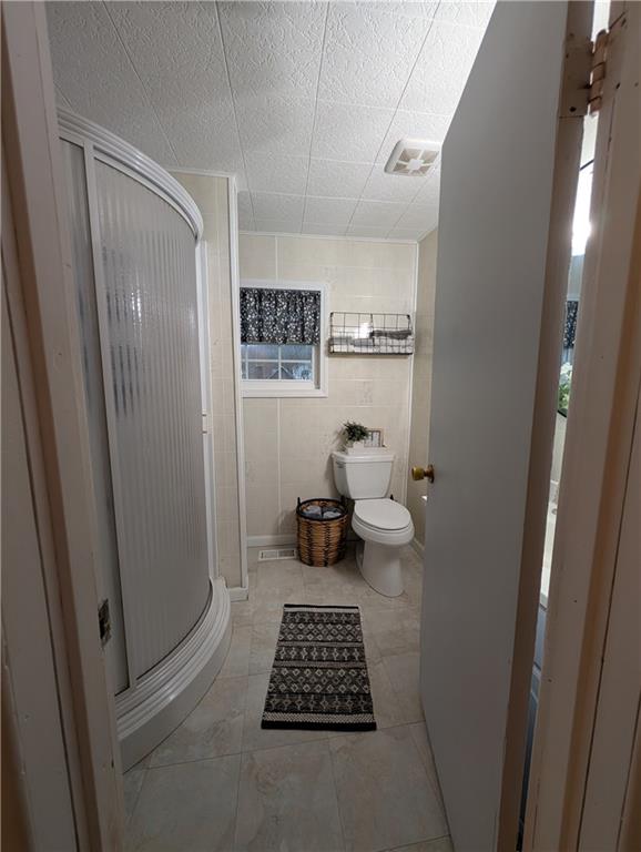 238 Hagentown Road Parker, PA 16049 - Photo 20 of 30 a bathroom with a toilet a sink and a window
