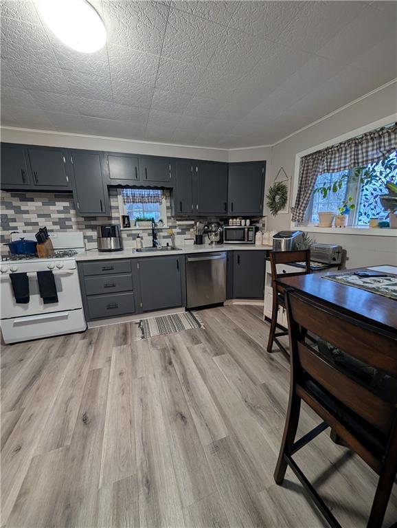 238 Hagentown Road Parker, PA 16049 - Photo 8 of 30 a kitchen with a sink a counter top space and appliances