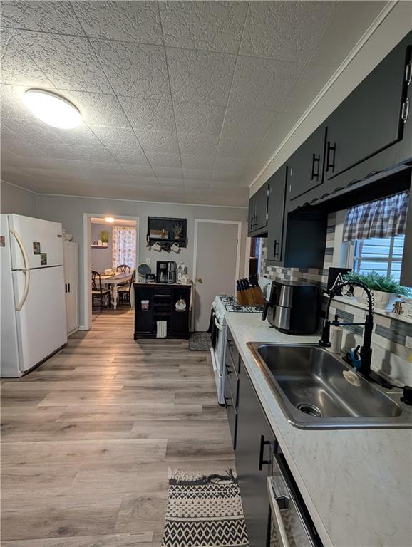 238 Hagentown Road Parker, PA 16049 - Photo 9 of 30 a kitchen with stainless steel appliances granite countertop a sink and stove