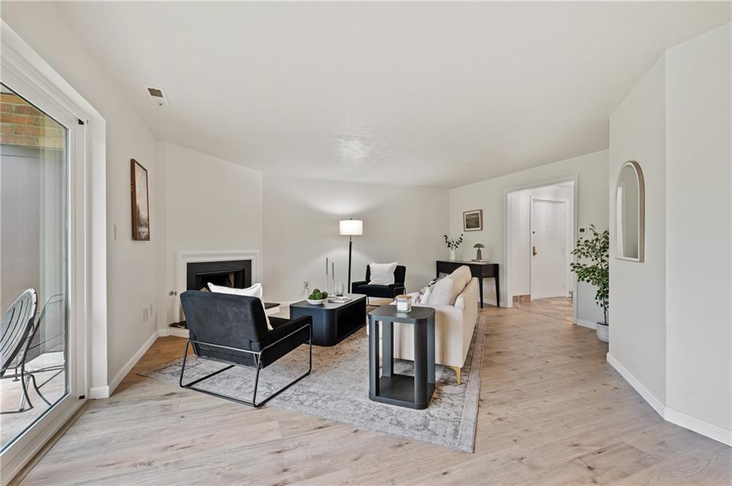 31 Huston Road Oakmont, PA 15139 - Photo 12 of 38 a living room with furniture a rug and a window