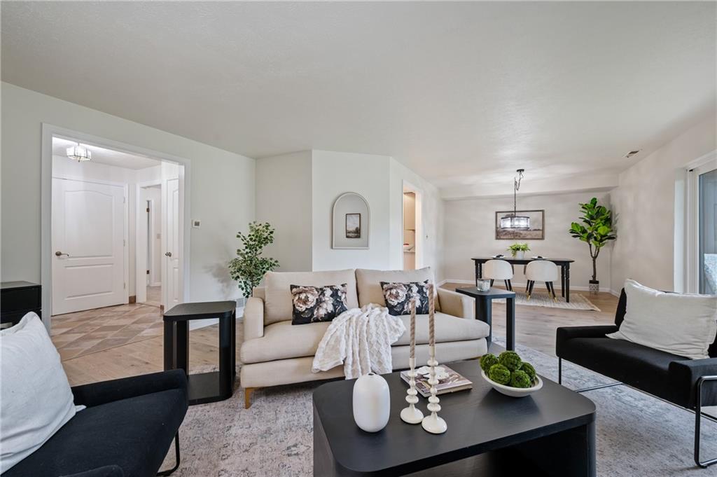 31 Huston Road Oakmont, PA 15139 - Photo 19 of 38 a living room with furniture potted plant and a window