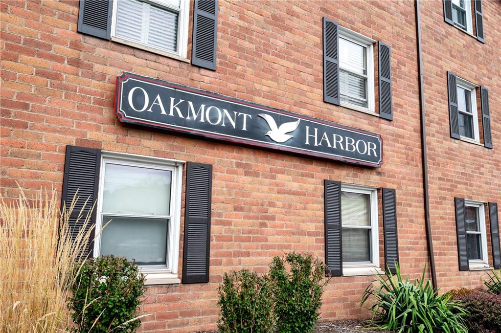 31 Huston Road Oakmont, PA 15139 - Photo 2 of 38 a view of a brick building with potted plants