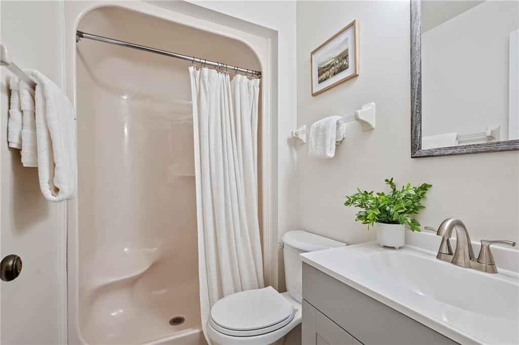 31 Huston Road Oakmont, PA 15139 - Photo 23 of 38 a bathroom with a sink toilet and shower