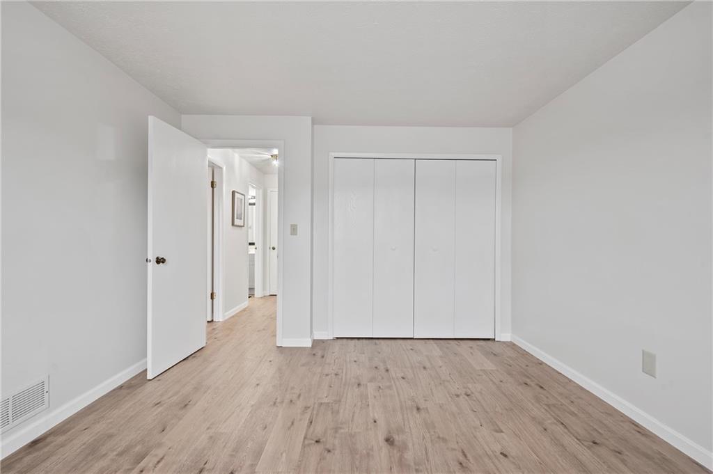 31 Huston Road Oakmont, PA 15139 - Photo 27 of 38 a view of an empty room with wooden floor