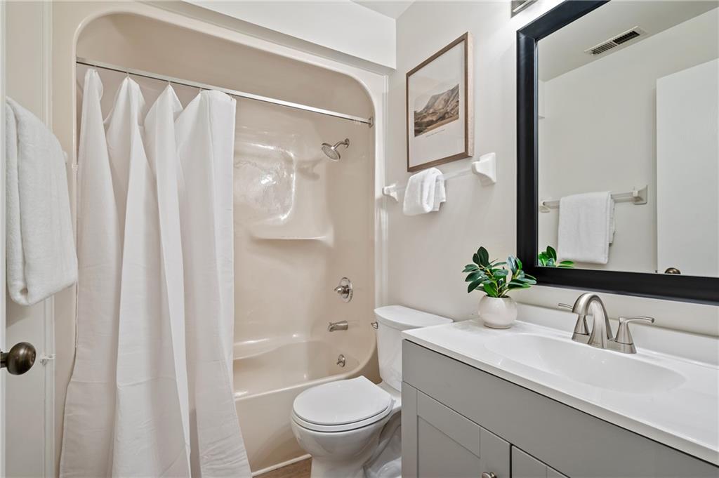 31 Huston Road Oakmont, PA 15139 - Photo 28 of 38 a bathroom with a granite countertop sink toilet and shower