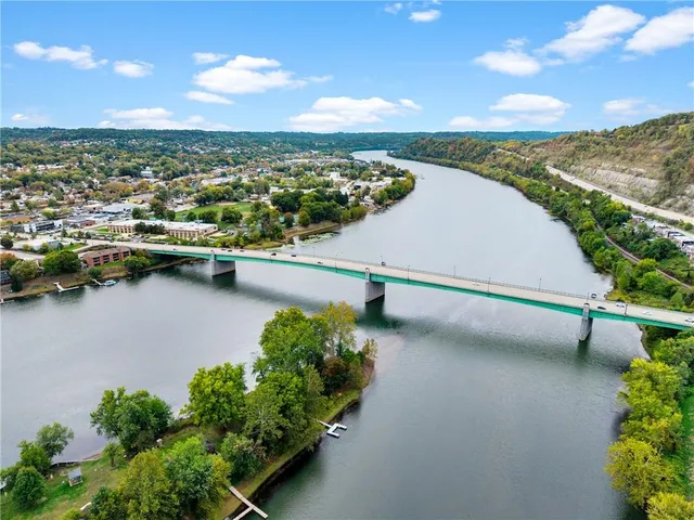 a view of a terrace with chairs and a table