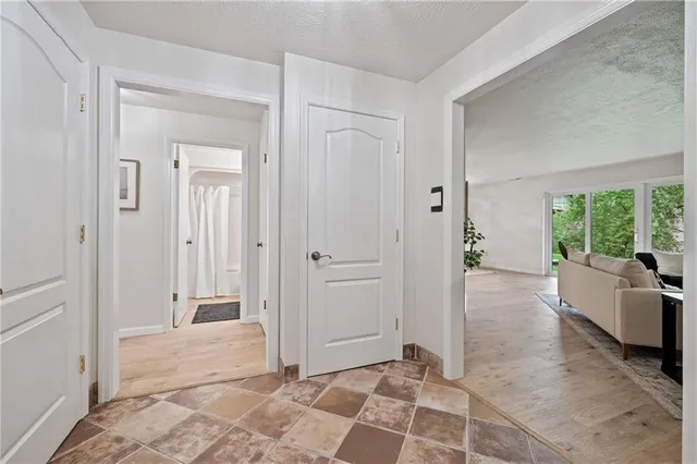 a view of livingroom with furniture window and front door