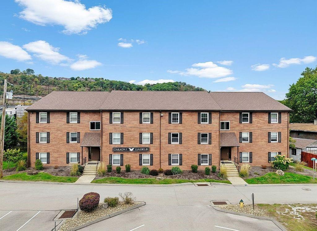 31 Huston Road Oakmont, PA 15139 - Photo 38 of 38 front view of a house with a yard