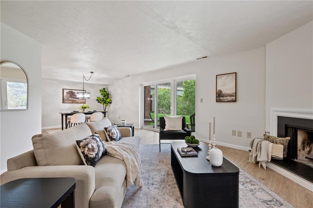 31 Huston Road Oakmont, PA 15139 - Photo 4 of 38 a living room with furniture and a fireplace