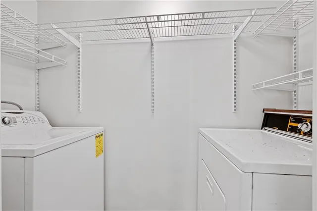 a utility room with dryer and washer