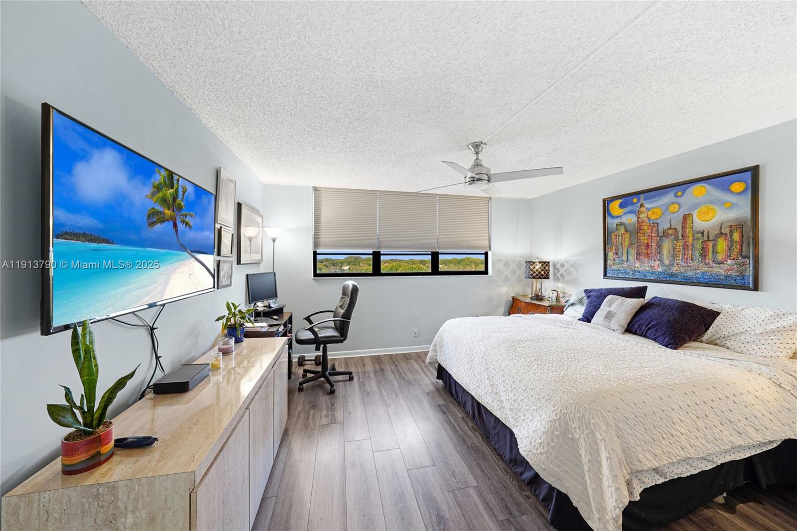 2430 DC Country Club Boulevard, Unit 6092 Deerfield Beach, FL 33442 - Photo 12 of 32 a bedroom with a bed and large windows