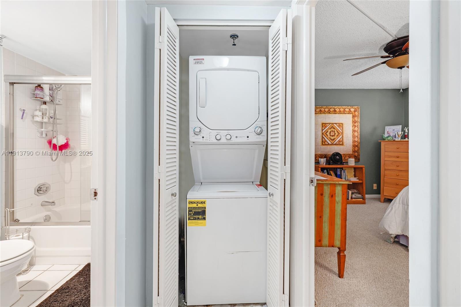 2430 DC Country Club Boulevard, Unit 6092 Deerfield Beach, FL 33442 - Photo 16 of 32 a bathroom with a toilet and a shower