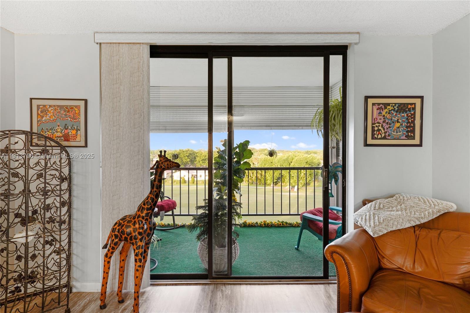 2430 DC Country Club Boulevard, Unit 6092 Deerfield Beach, FL 33442 - Photo 18 of 32 a bed room with a bed and a chair