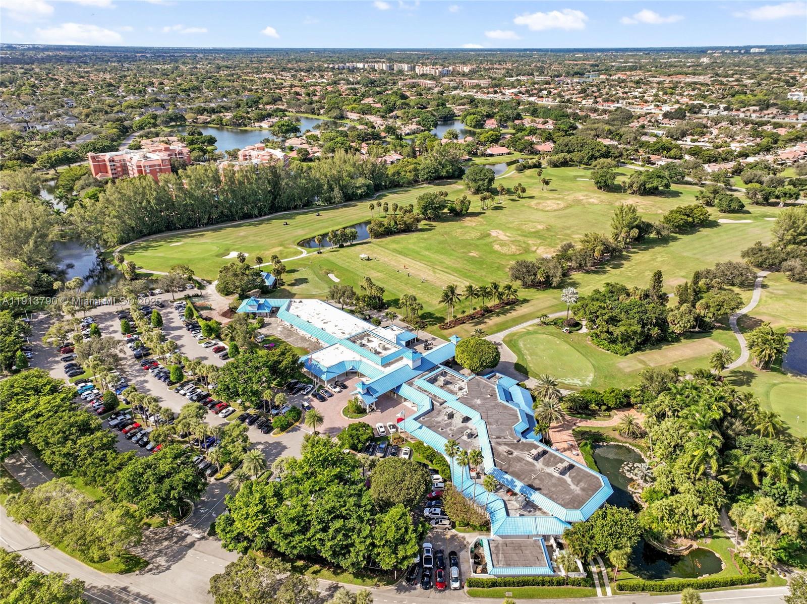 2430 DC Country Club Boulevard, Unit 6092 Deerfield Beach, FL 33442 - Photo 27 of 32 an aerial view of residential houses with outdoor space