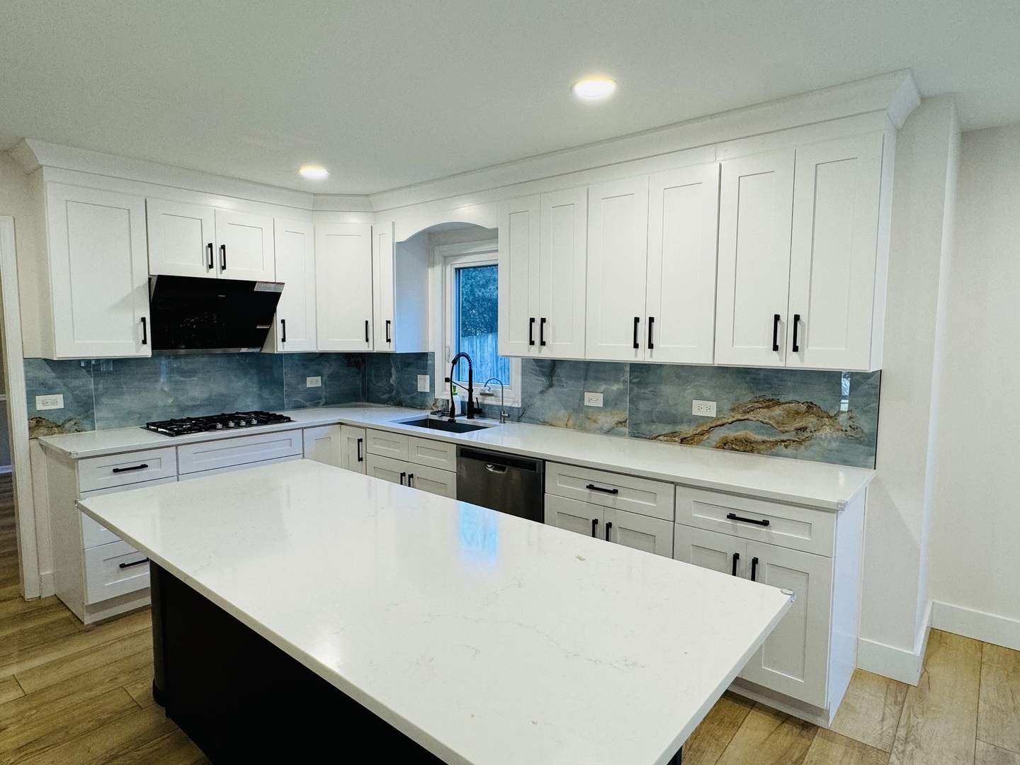 1398 East Gartner Road Naperville, IL 60540 - Photo 7 of 31 a kitchen with granite countertop white cabinets and white appliances