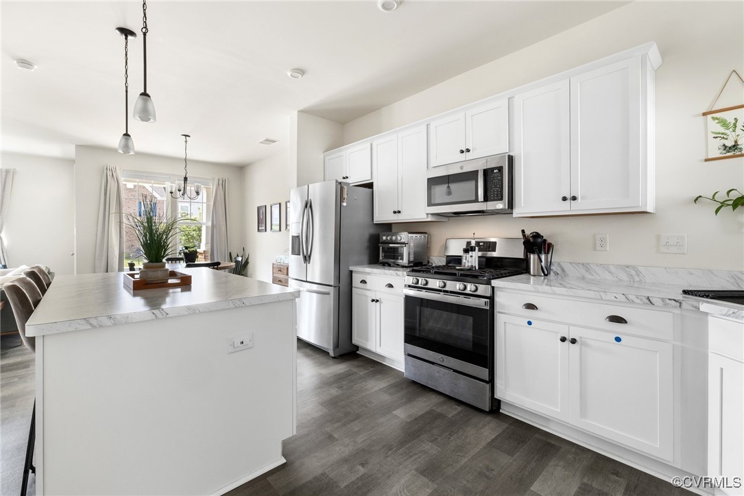 7817 Old Guild Road North Chesterfield, VA 23237 - Photo 11 of 44 Bright white kitchen cabinets overtop the easy to