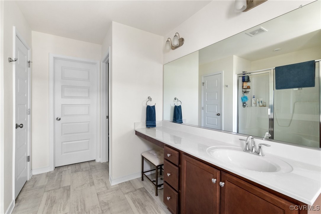 7817 Old Guild Road North Chesterfield, VA 23237 - Photo 17 of 44 The larger vanity comes with makeup area