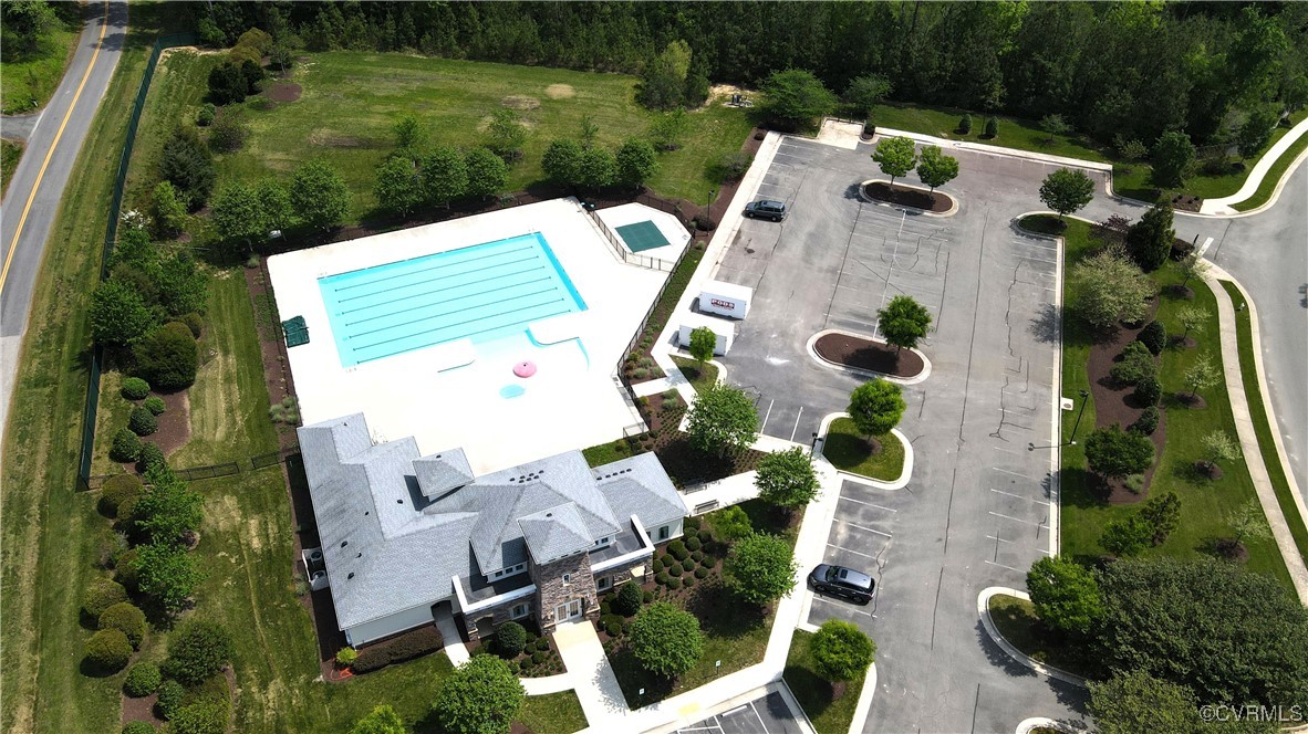 7817 Old Guild Road North Chesterfield, VA 23237 - Photo 38 of 44 A fully fenced-in large pool, a kiddie pool and wa