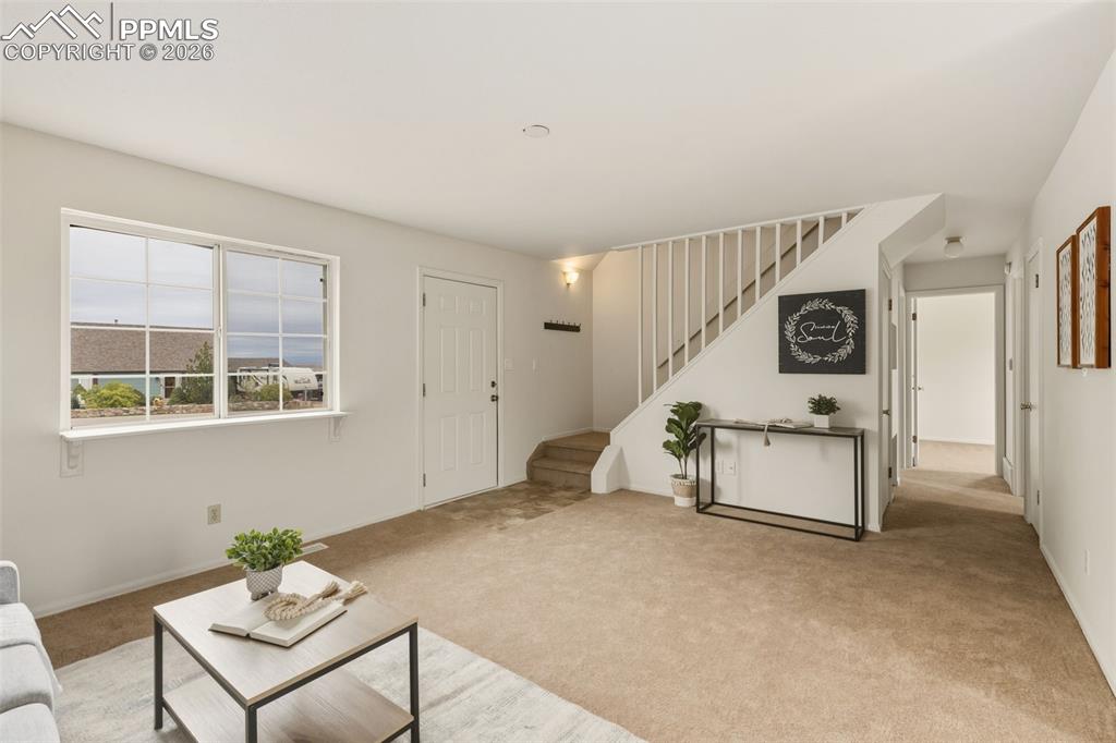 9430 Bar B Road Fountain, CO 80817 - Photo 13 of 43 a living room with furniture and a window