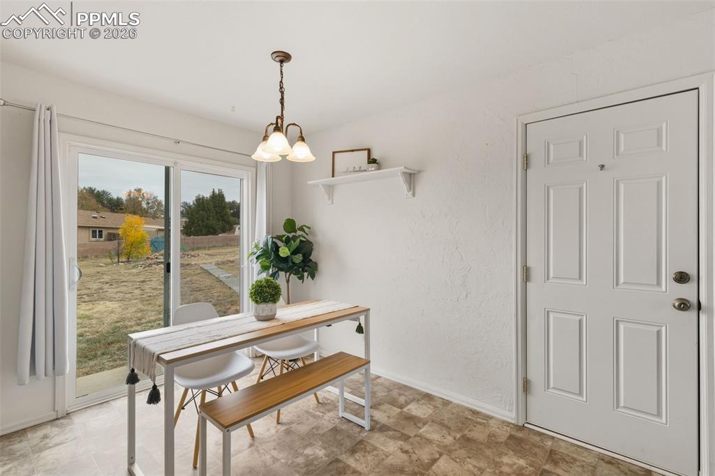 9430 Bar B Road Fountain, CO 80817 - Photo 21 of 43 a living room with furniture and a window