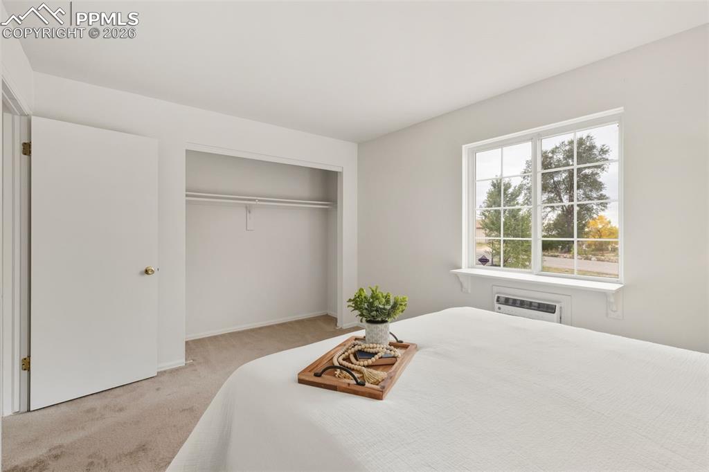 9430 Bar B Road Fountain, CO 80817 - Photo 23 of 43 a bedroom with a bed and a window
