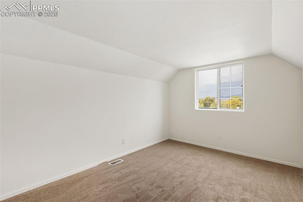 9430 Bar B Road Fountain, CO 80817 - Photo 26 of 43 an empty room with windows