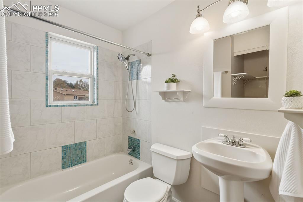 9430 Bar B Road Fountain, CO 80817 - Photo 31 of 43 a bathroom with a sink toilet and shower