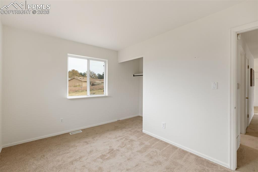 9430 Bar B Road Fountain, CO 80817 - Photo 33 of 43 an empty room with windows