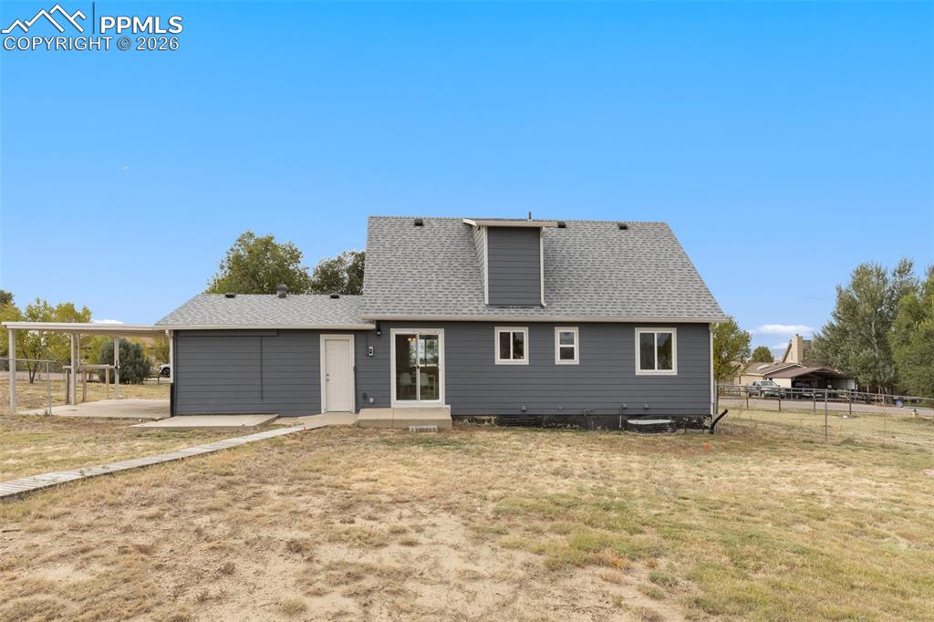 9430 Bar B Road Fountain, CO 80817 - Photo 42 of 43 front view of a house with a yard
