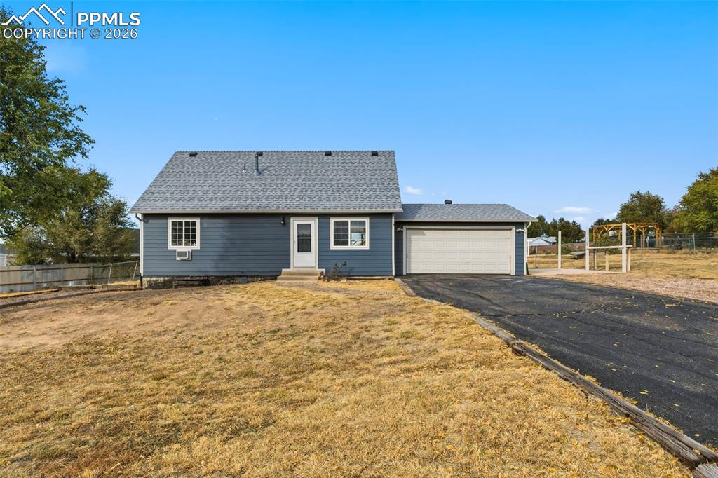 9430 Bar B Road Fountain, CO 80817 - Photo 5 of 43 a house with a outdoor space