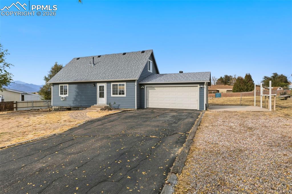 9430 Bar B Road Fountain, CO 80817 - Photo 6 of 43 a house view with a backyard space