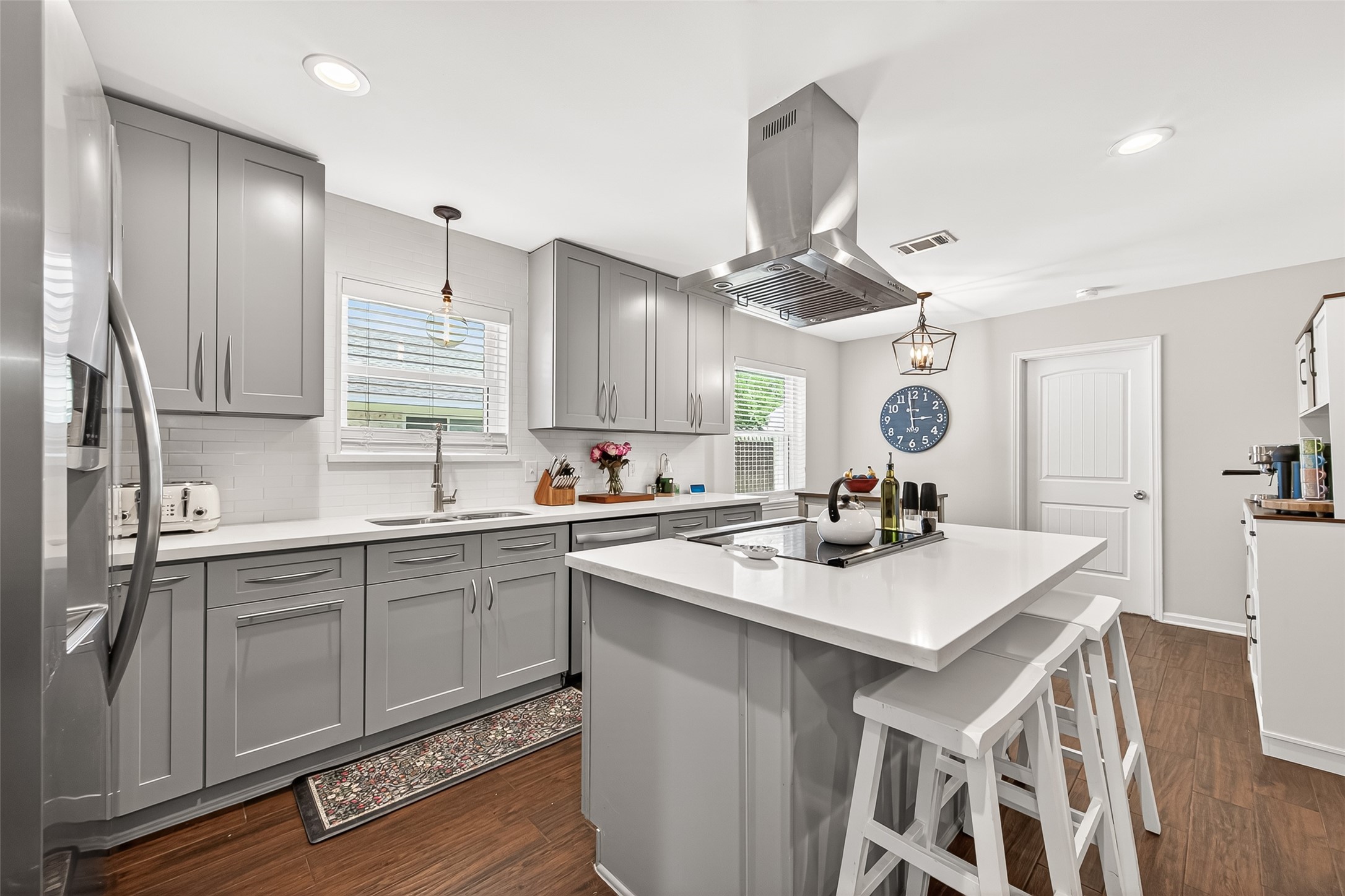 2610 Teague Road Houston, TX 77080 - Photo 23 of 49 This home offers multiple inviting dining spaces, including bar seating at the kitchen, a dining room, and a cozy breakfast nook—providing plenty of options for everyday meals and entertaining.