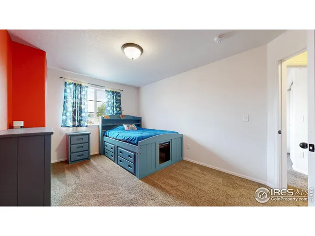 a kitchen with a cabinets and window