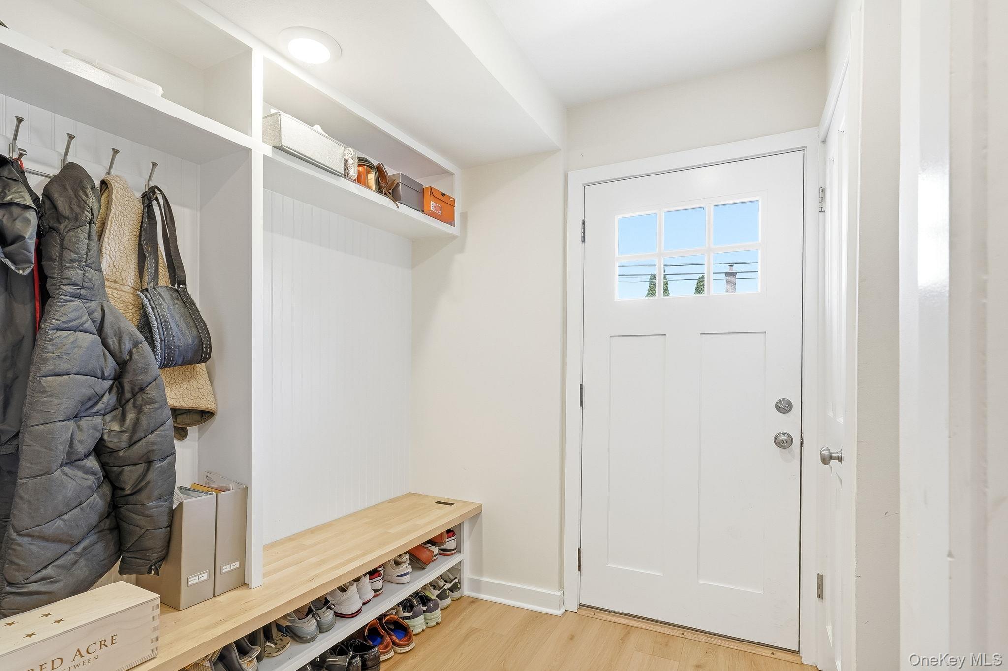 56 Wainwright Street Rye, NY 10580 - Photo 14 of 17 New Mudroom with Custom Bench/Shelving with Access to Attached Garage