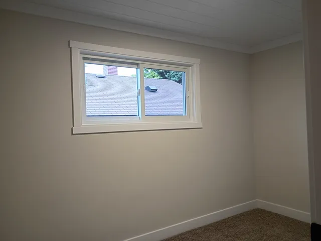 an empty room with a window