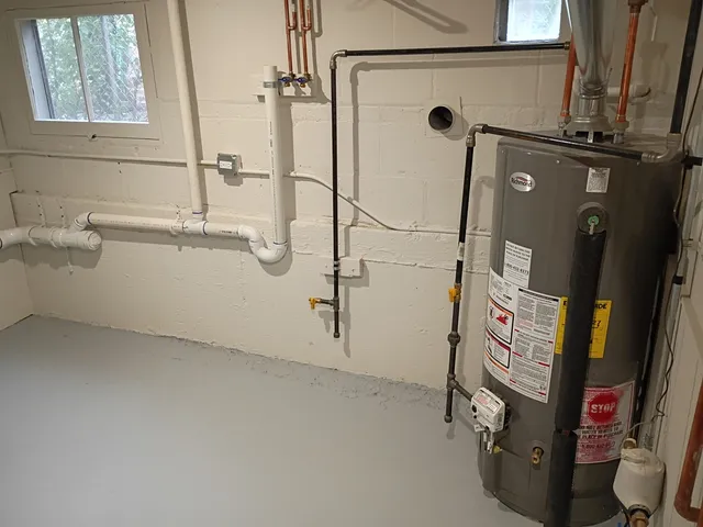 a bathroom with a tub and a shower