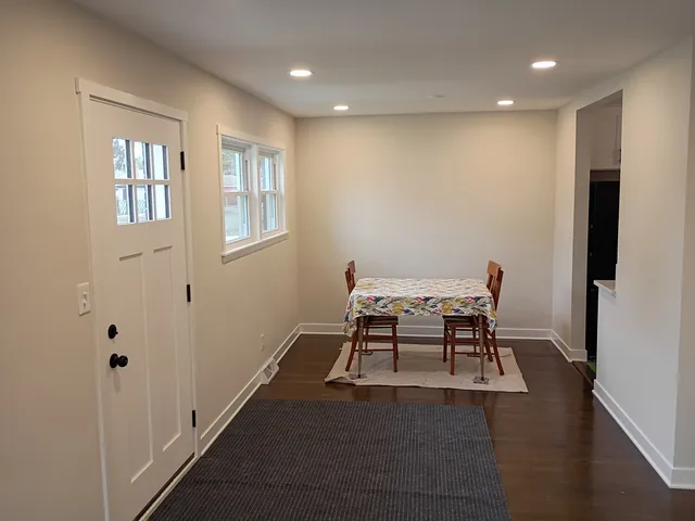 a work room with furniture and windows